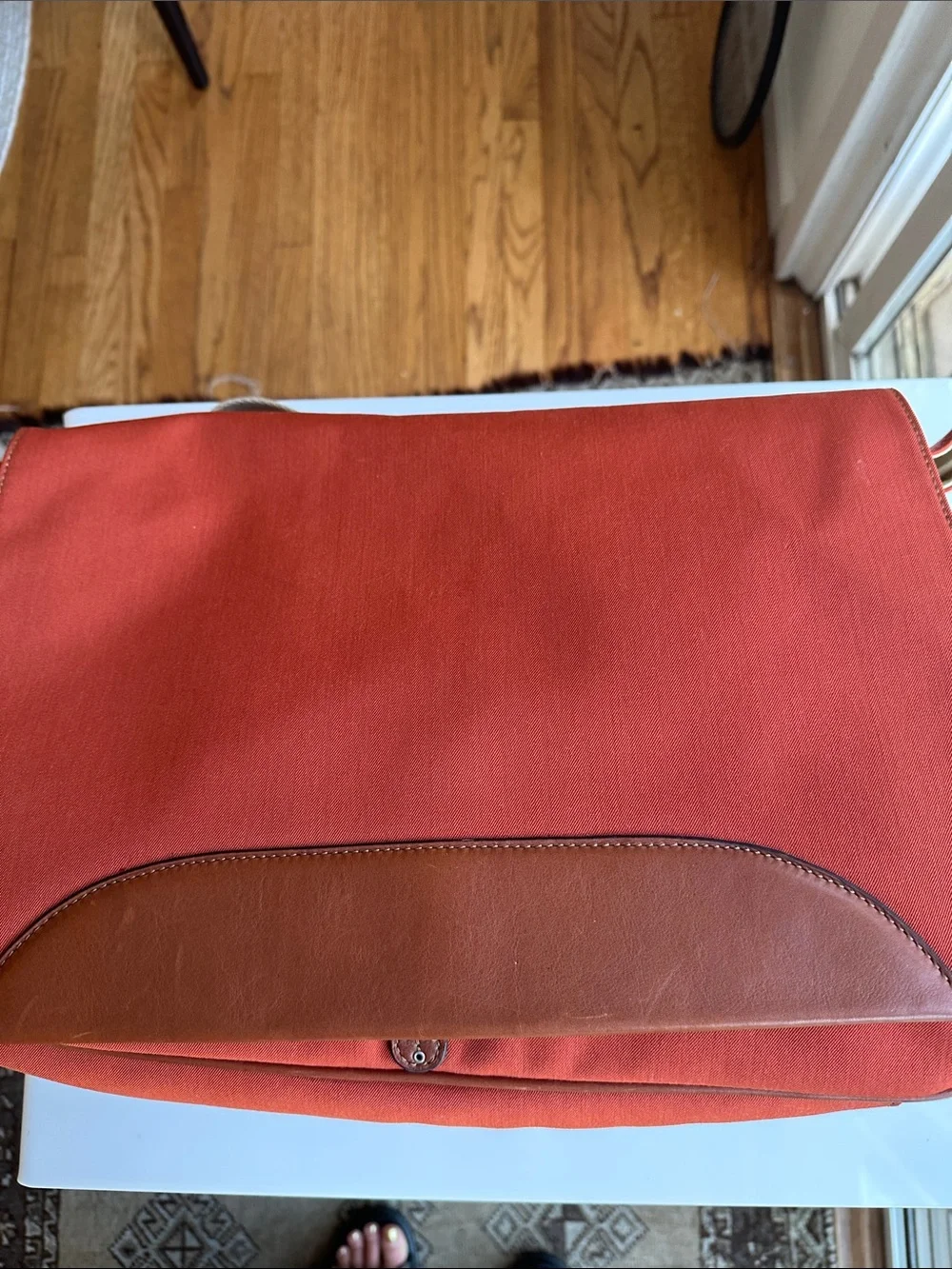 Trafalgar men’s messenger bag burnt orange with leather trim! Live New